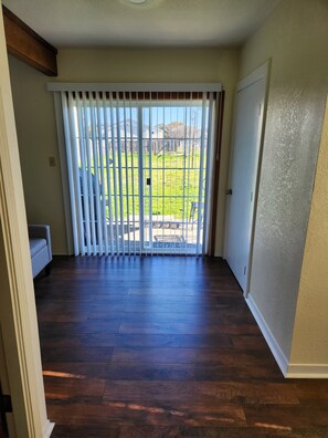 Sliding glass doorway to the back yard.