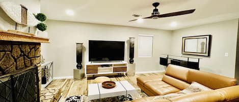 Beautifully designed living room with luxurious leather sectional.
