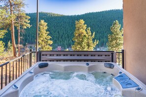 Enjoy the quiet seating on the patio or soak in the hot tub with a nice beverage. Nothing beats a hot tub with a captivating view!