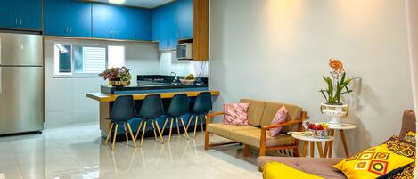 Sala e cozinha, conceito aberto
Espaço Confortável e muito Aconchegante !