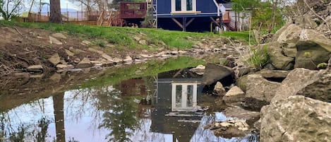 View from College Street bridge of A-frame duplex at 517-519 College Street