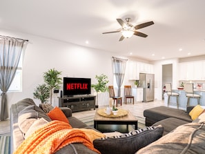 Furniture, Indoors, Living Room, Screen, Couch