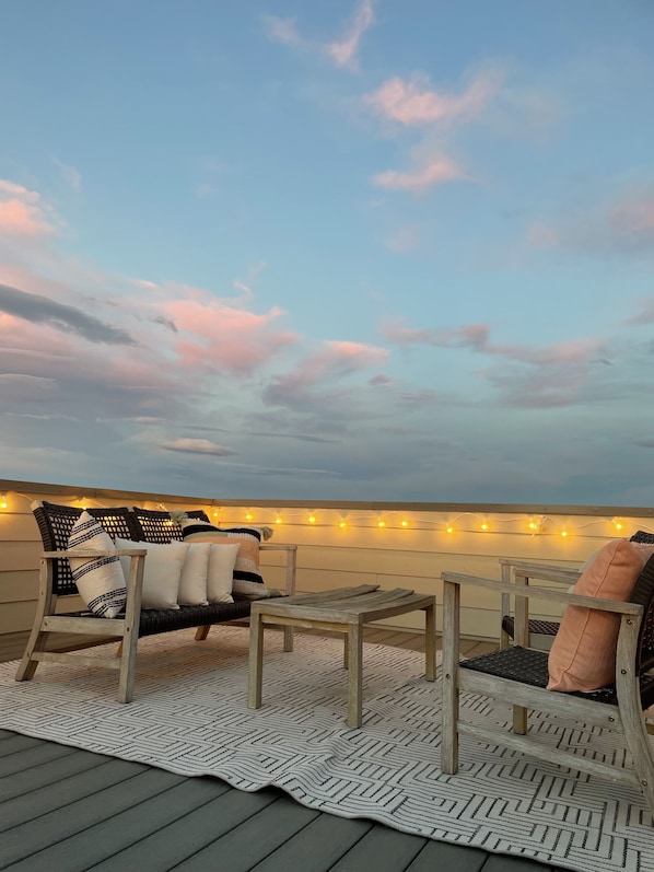 Private rooftop deck at sunset