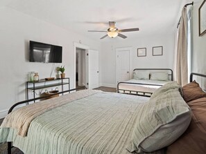 Master bedroom with 2 separate queen beds located on the second flr