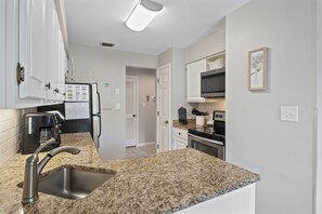 Fully renovated and well stocked kitchen with new appliances.