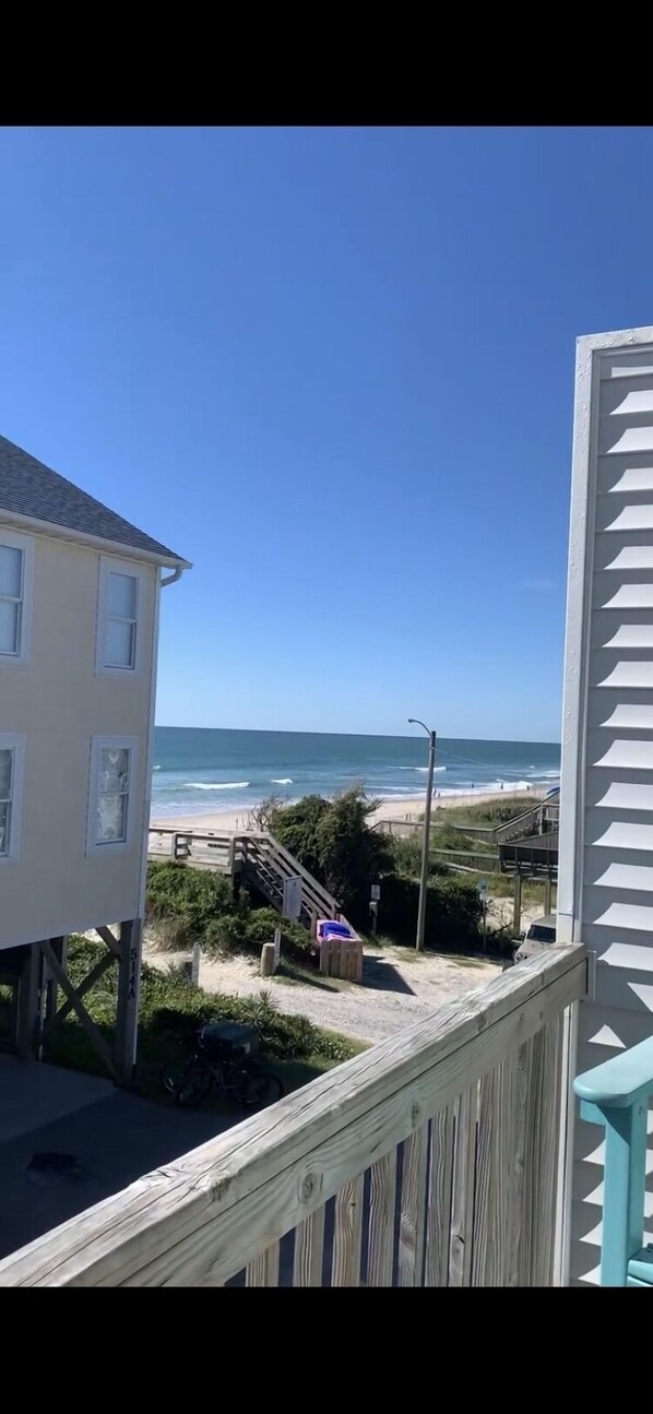 The beach view to your right as you sit on the deck. 