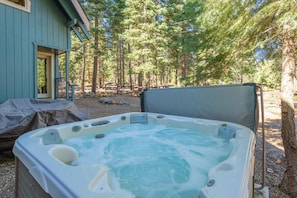 Enjoy the hot tub after a long day of skiing or sledding.
