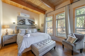 Newly added large master suite includes a cozy king bed.