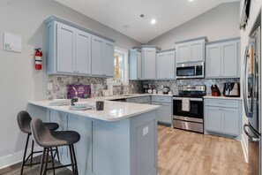 Large fully stocked kitchen with a wide variety of small appliances including Air Fryer & Instant Pot.
