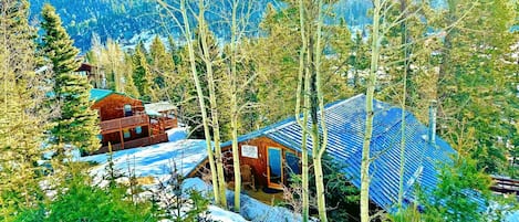 View from the top of the property surrounded by the Sangre de Cristo Mountains.