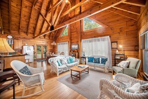 Living Room - Living room with cathedral ceiling.