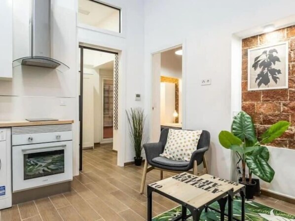 Large living room with kitchen