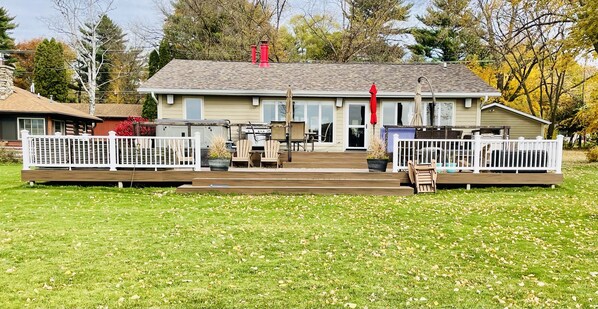 EXTRA LARGE DECK IS TWO LEVELS- 1400 SQUARE FEET AND FEATURES UPSCALE FURNITURE