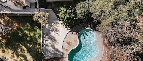 Aerial view of pool and deck area.