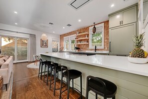 Large island, open kitchen to living