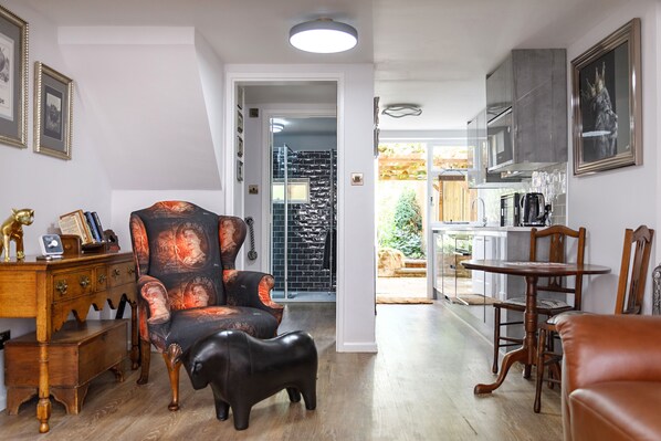 Living / dining room feature chair and bull foot stool 1