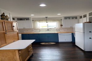 Kitchen with original farm sink.