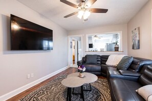 Living room with 6 person reclinable couch