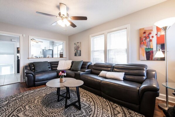 Living room with 6 person reclinable couch