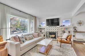 Living room with fireplace and smart TV