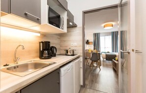 Curb your appetite by indulging on a snack in your kitchenette!