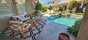 Outdoor seating area and pool