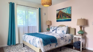 queen bedroom with desk/ workspace