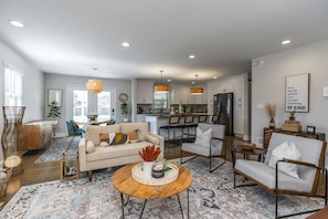 Beautiful new open floor plan! The family room has a couch, love seat & 2 chairs