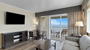 Living room and balcony with bay view