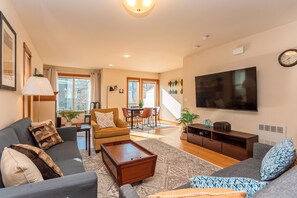 Cozy living room (now only with one couch to provide more common area space)