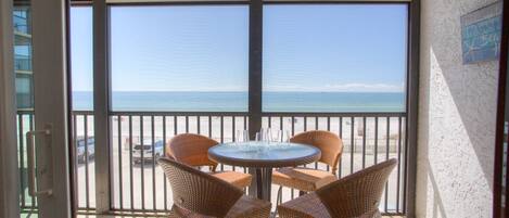 Beachfront Screened-In Balcony with Spectacular Views of the Gulf and the Evening Sunsets
