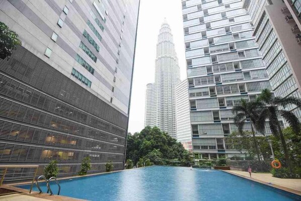 The beautiful outdoor pool with a stunning view of Petronas Twin Towers.