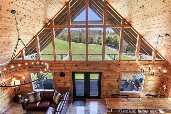 Walk into a beautiful log cabin with cathedral ceilings! 