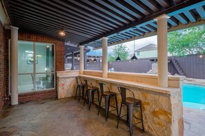 A bar with chairs