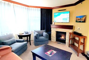 Trey's fireplace suite with premium cable/ HBO, foldout sofa bed