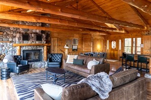 Living room with real wood fireplace