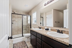 Shower and double vanity in the Master bathroom & attached large master closet.