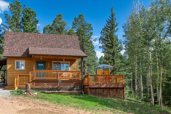 Nestled on 1.3 acres of wooded nature filled with aspens, spruce and pines.