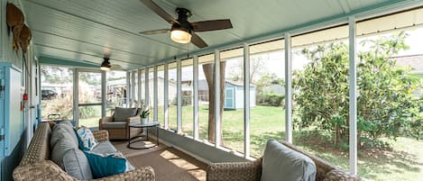 Screened in porch for morning coffee or evening drinks