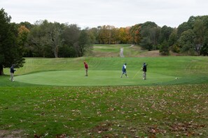 Settled directly on the Norwich Public Golf Course adjacent to holes 16 and 17.  Watch players as they pass on the fairway.