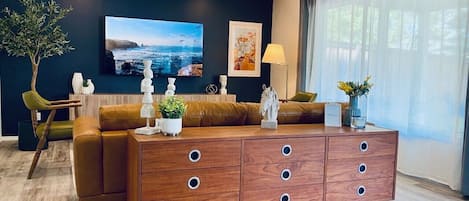 Living room
- 65'' smart TV
- Marble coffee table
- Gimbal pot lights
