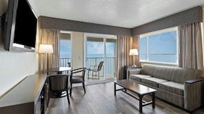 Living room and balcony with bay view