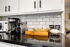 Coffee bar—take your pick from filtered coffee, Nespresso, French press, or tea