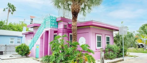 The Famous Pink Cottage of Indian Shores is directly across the street from private BEACHFRONT access!
