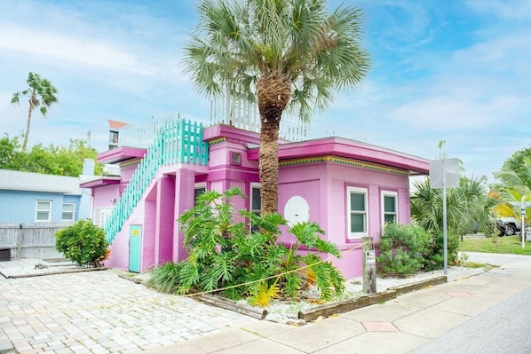 The Famous Pink Cottage of Indian Shores is directly across the street from private BEACHFRONT access!