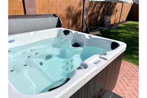 Take Advantage of this hot tub and its jets!