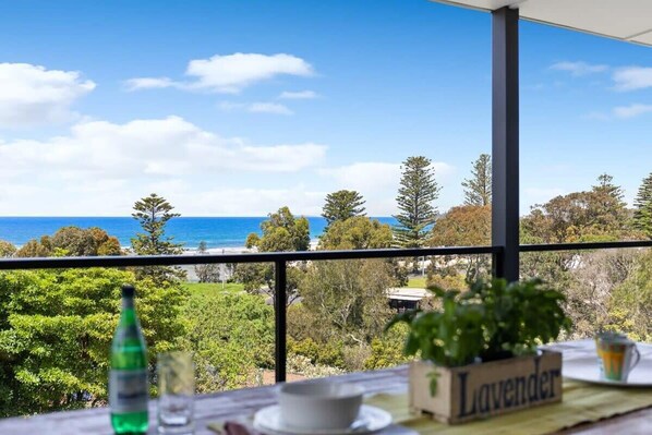 Upper level deck - covered with ocean views & bbq!