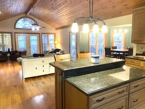 Kitchen looking into the living room and dining room