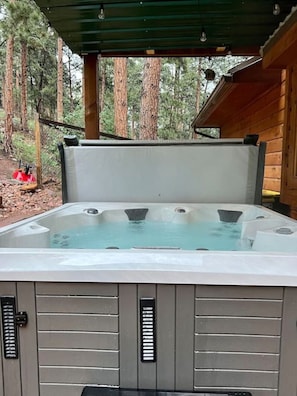 Private 5 person hot tub, perfect to unwind and watch the wildlife