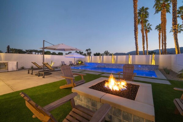 Poolside Fire Pit at Night